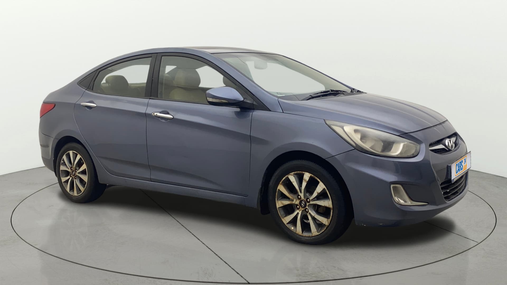 2014 FLUIDIC 1.6 VTVT SX OPT — ₹3.38L on Cars24