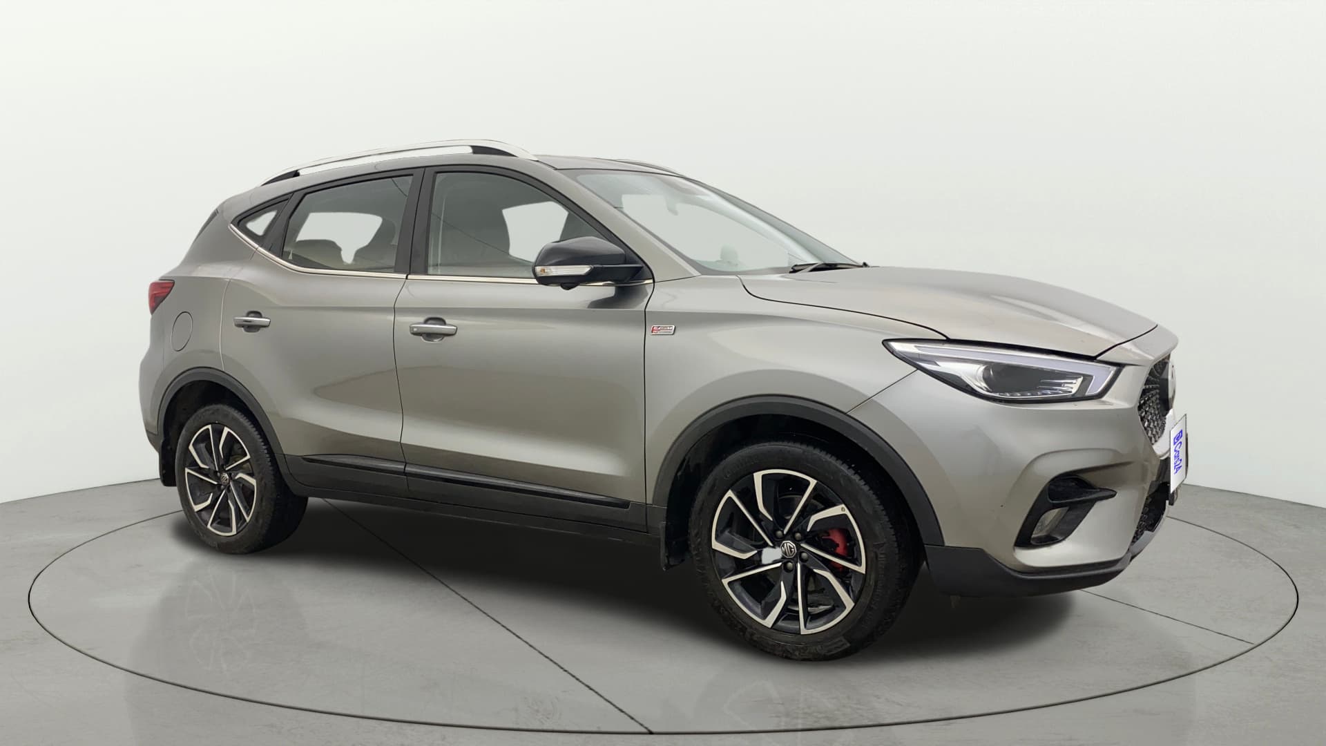 2023 SAVVY 1.3 TURBO AT S RED — ₹10.2L on Cars24
