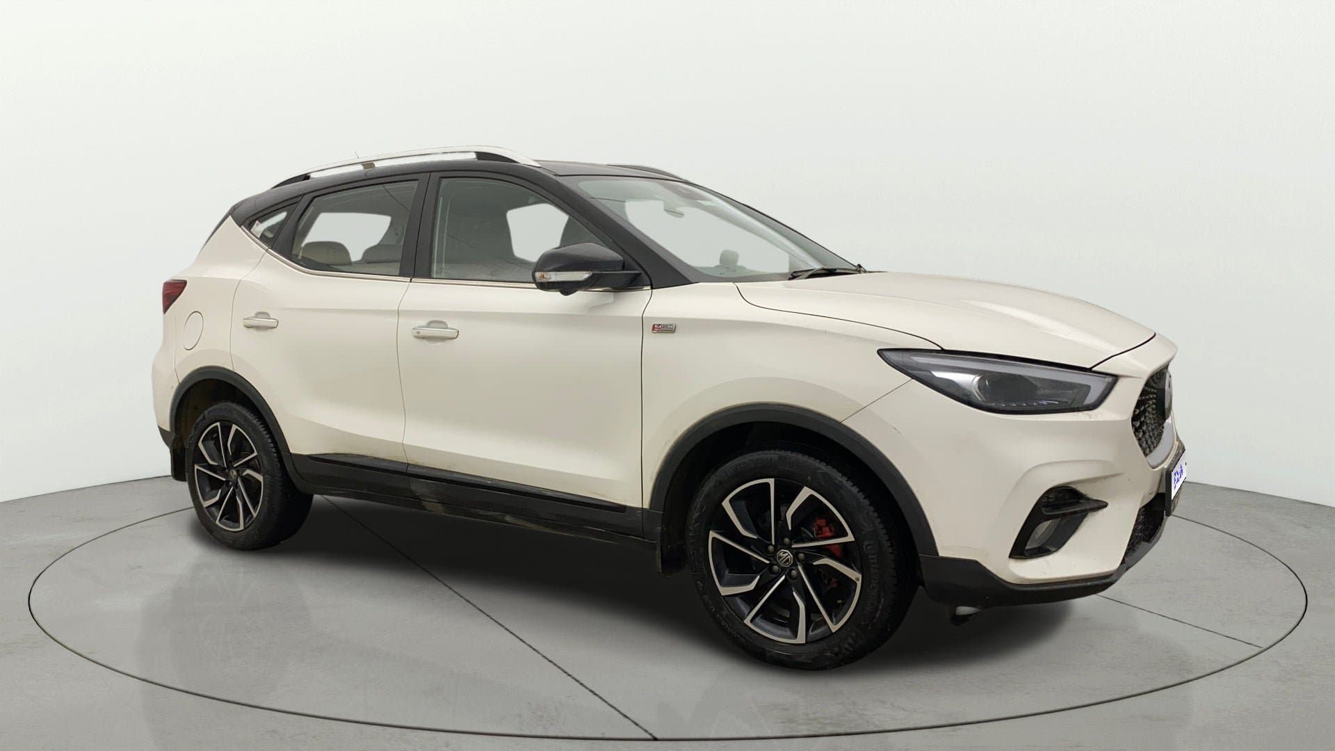 2023 SAVVY 1.3 TURBO AT S RED — ₹10.2L on Cars24